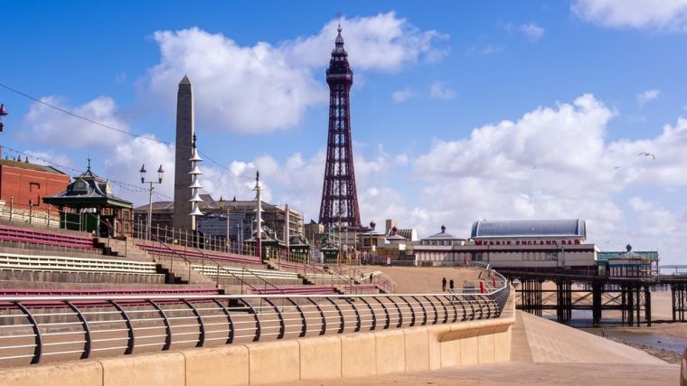 Blackpool Tower and a deserted promenade due to covid 19 restrictions.