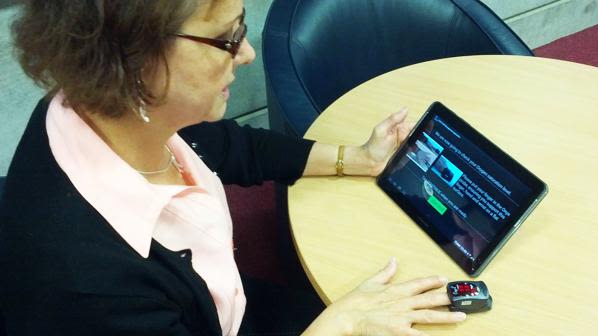 A patient trials the tablet-based digital mobile health system