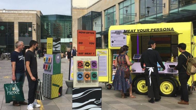 The 'Meat Your Persona' yellow horsebox van on tour in Cardiff